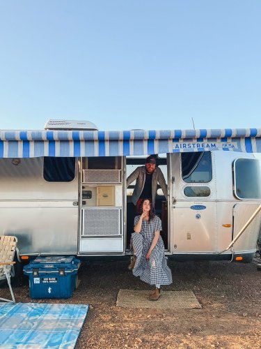 A blue banquette and green cabinetry prove that motor homes can still be stylish