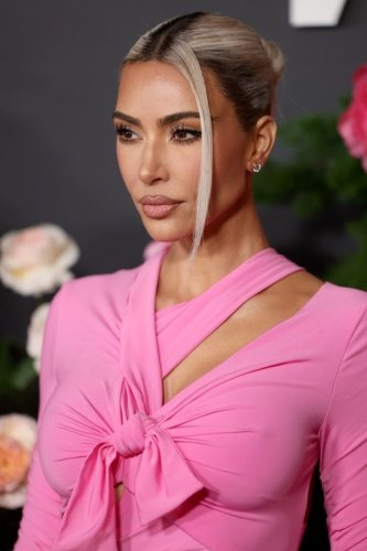 Kim Kardashian's transparent 'Barbie' dress gets her mistaken for Hollywood star