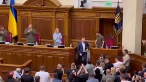 Polish president hugs Zelensky before first address to Ukraine’s wartime parliament