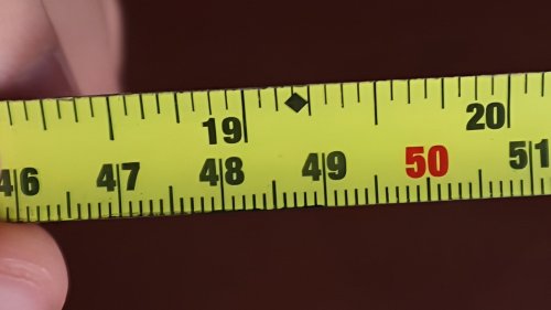 What Are Those Black Diamonds On Tape Measures Really For?