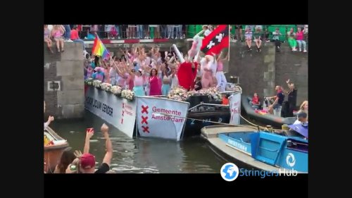 Huge crowds at Amsterdam water parade in Netherlands