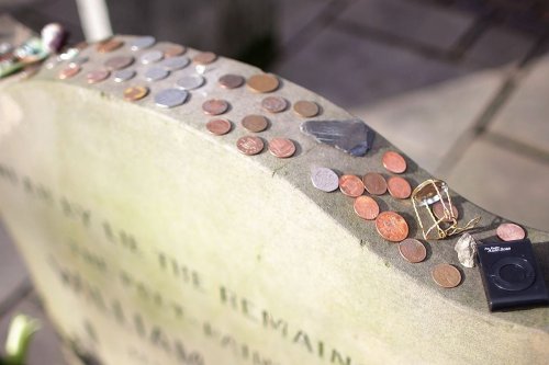 What It Means If You See a Coin on a Gravestone