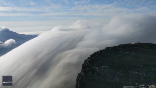 'Magical' Cloud Formation Rolls Over Australian Mountain in Timelapse