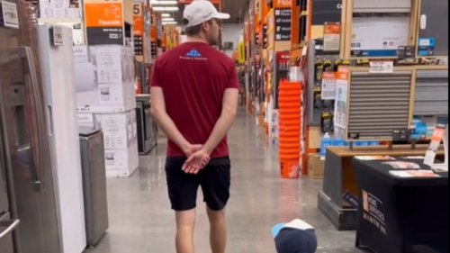 Son mimics dad's every move in the display of hero worship at Home Depot