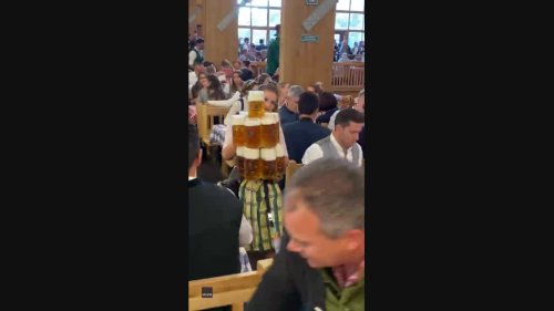 'Respect': Oktoberfest Waitress Carrying Giant Beer Order Wows Onlookers