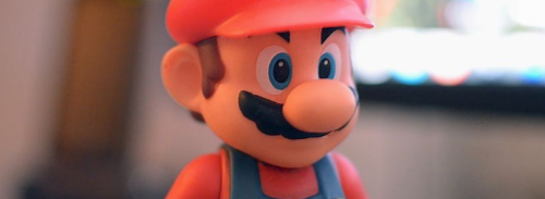Did you know Super Mario isn't human? Oh, and he's punching Yoshi