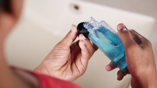 Can Mouthwash Prevent You From Getting Sick On An Airplane? Here's What We Know