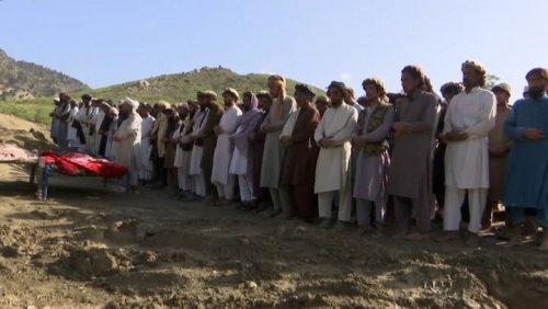 Afghans bury loved ones in mass grave after earthquake kills at least 1,000