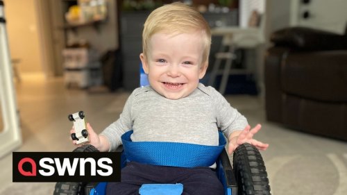 US toddler with spina bifida has mastered the use of his tiny wheelchair
