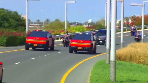 Watch: Trump welcomed by parade of red Cybertrucks and camels during Qatar visit