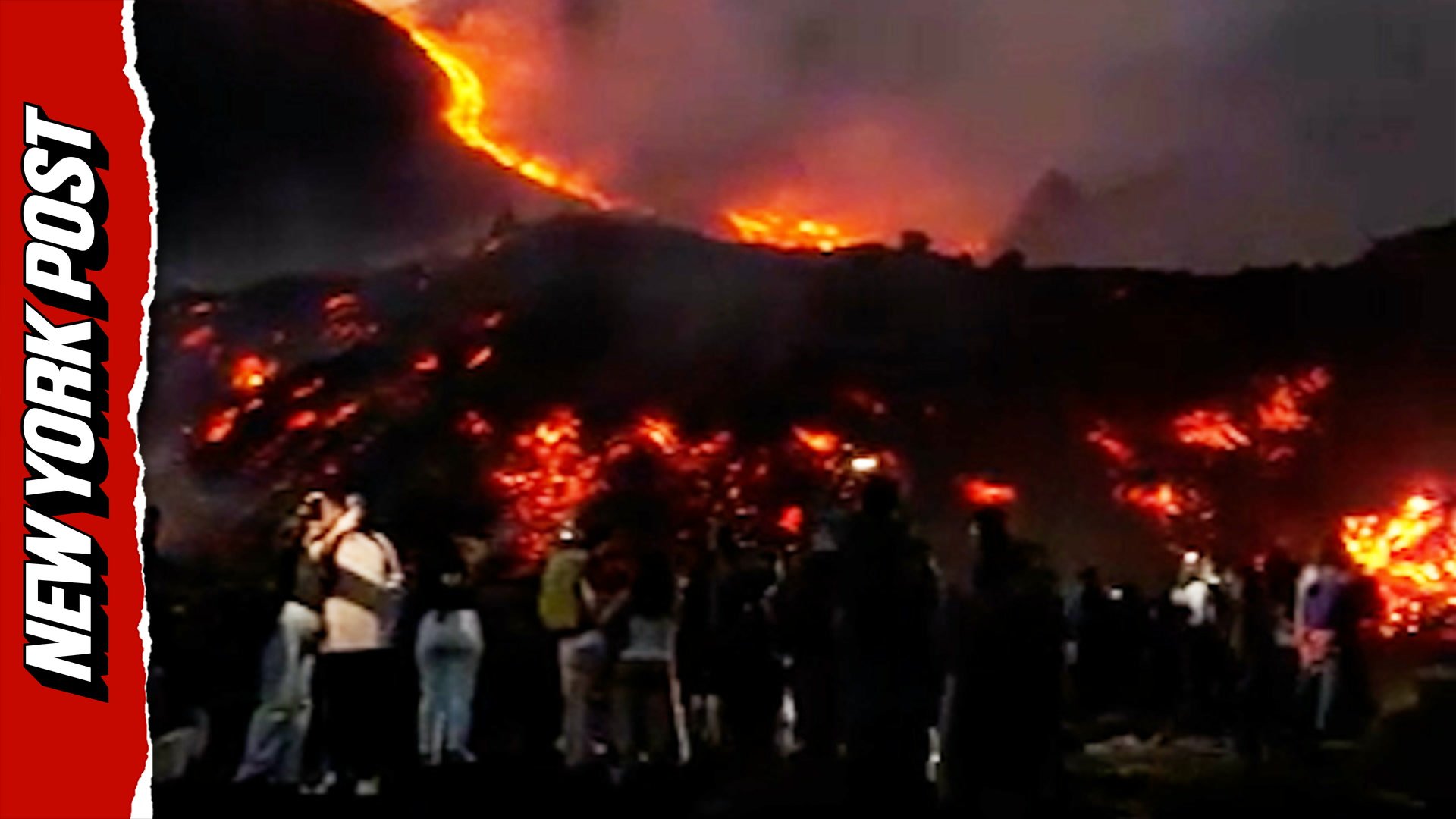 Volcano hikers get up close and personal with lava spewing from Italy's Mount Etna