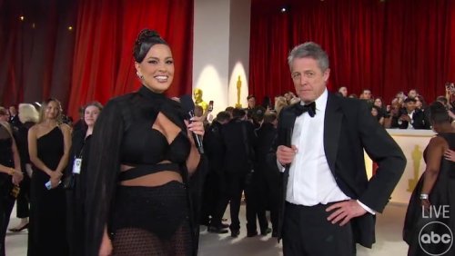 Watch Hugh Grant’s awkward red carpet interview at 2023 Oscars