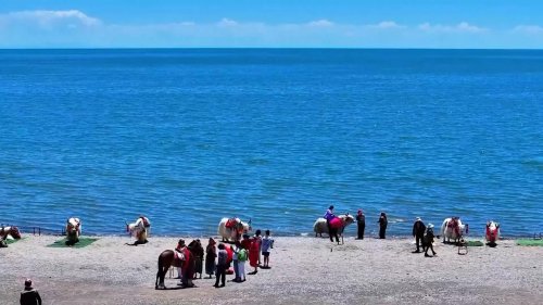 China: China launches campaign to spur summer tourism.