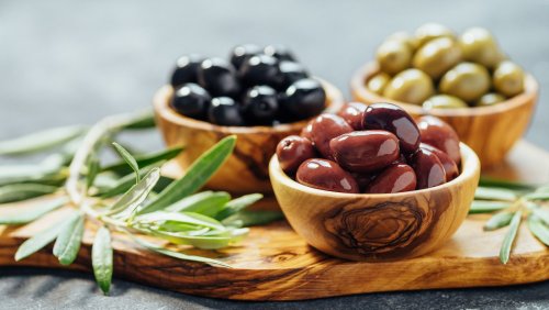 Easily Pit A Platter Of Olives Using Only A Funnel