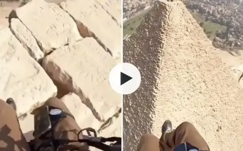 Man paragliding over the pyramids captures what’s written on the top