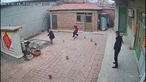 Child Practicing Football Skills At Home in Cangzhou, Hebei, China