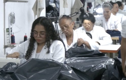 Venezuelan fashion designer swaps dresses for body bags