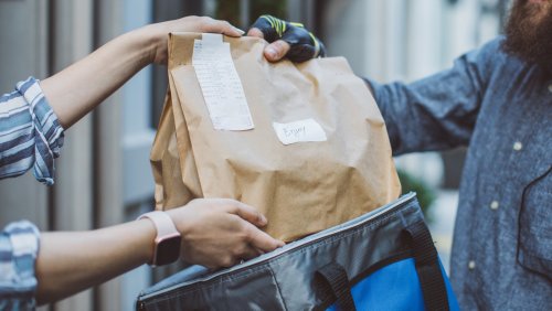 The Unspoken Rules For Tipping Your Food Delivery Person
