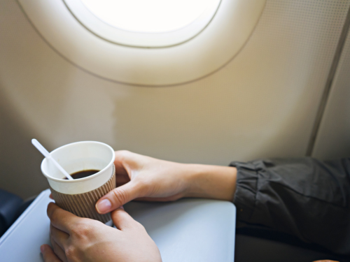 The Shocking Reason You Should Never Drink Coffee Or Tea On A Flight