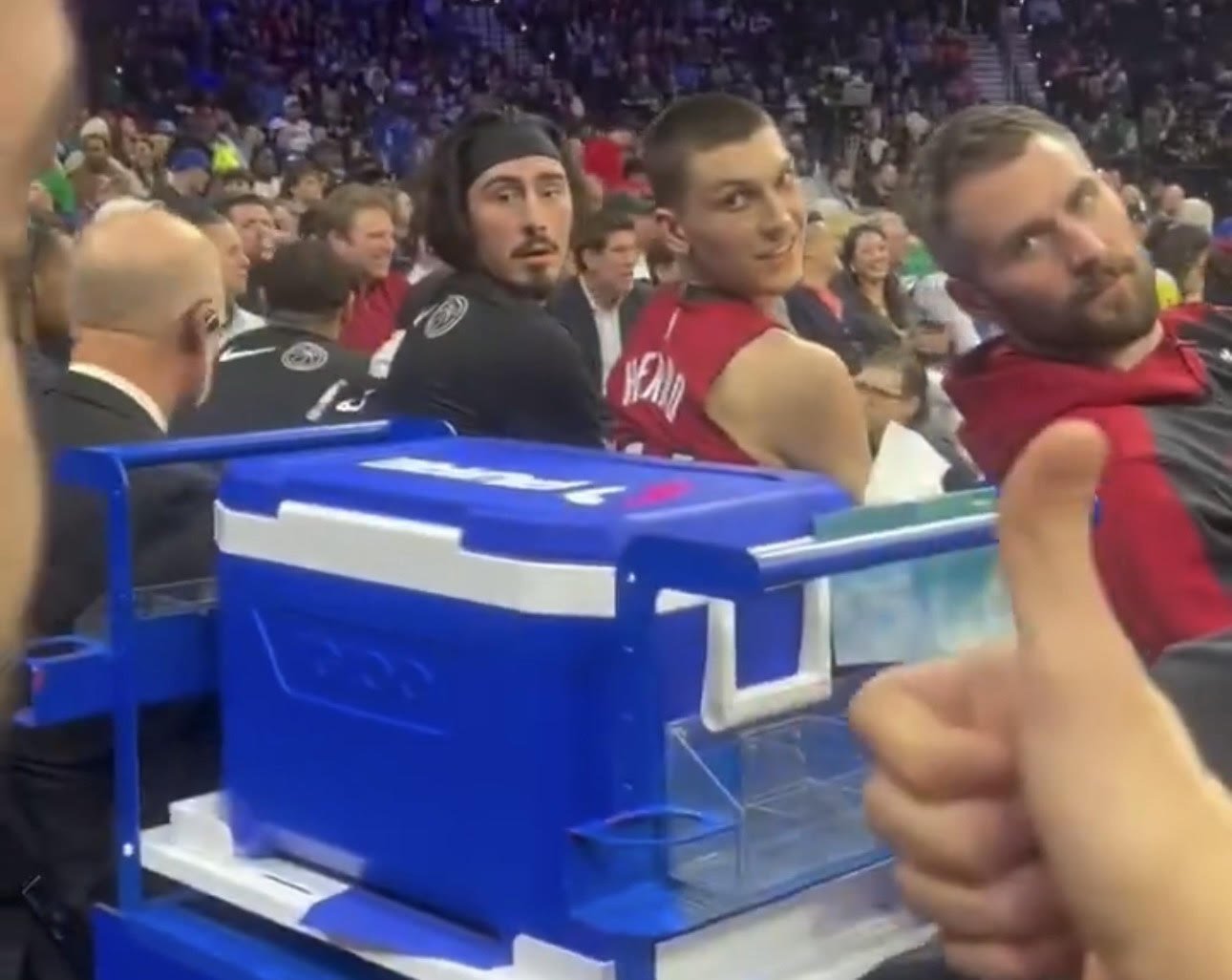 Watch the Heat bench react as fans break the news about Jimmy Butler's trade