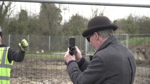 Mystery man in bowler hat sparks rumours Banksy caught on camera