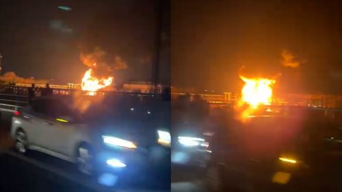 Drivers pull over to watch the substation fire near Heathrow airport