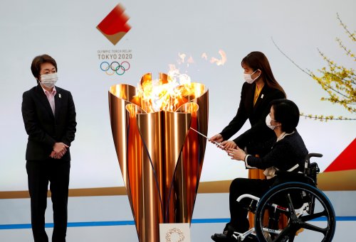 Japan's Osaka weighs cancelling leg of Olympic torch relay over virus surge