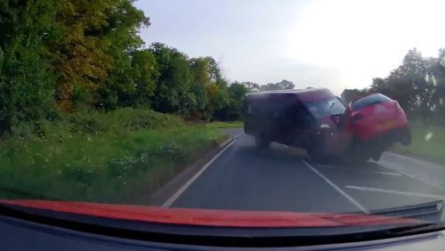 Moment wrong-way minibus driver smashes head-on into car
