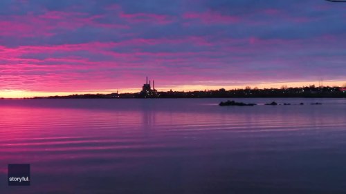 'Awesome' Purple Sunrise Reflected in Calm Waters of Lake Superior