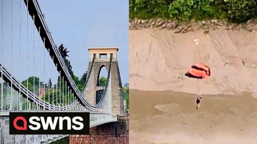Two base jumpers seen jumping off one of Britain's most iconic bridges