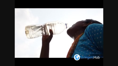 Working Peopel Drink Water Against The Sun in Dhaka, Bangladesh 2
