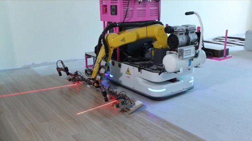 China: Robot lays floor tiles with precision in unfinished Chinese home