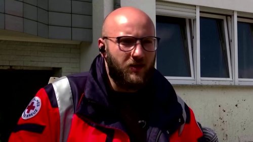 'Like back in Syria': Refugees join flood clean-up
