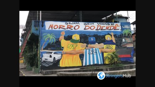Residents of Rio's largest favela decorate the streets ahead of Brazil's first game of the World