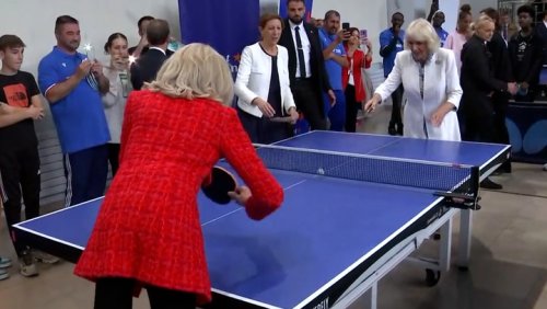 Queen enjoys game of ping pong with Brigitte Macron
