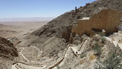 'We yearn for people to return:' Syrian desert monastery reopens after a decade of war