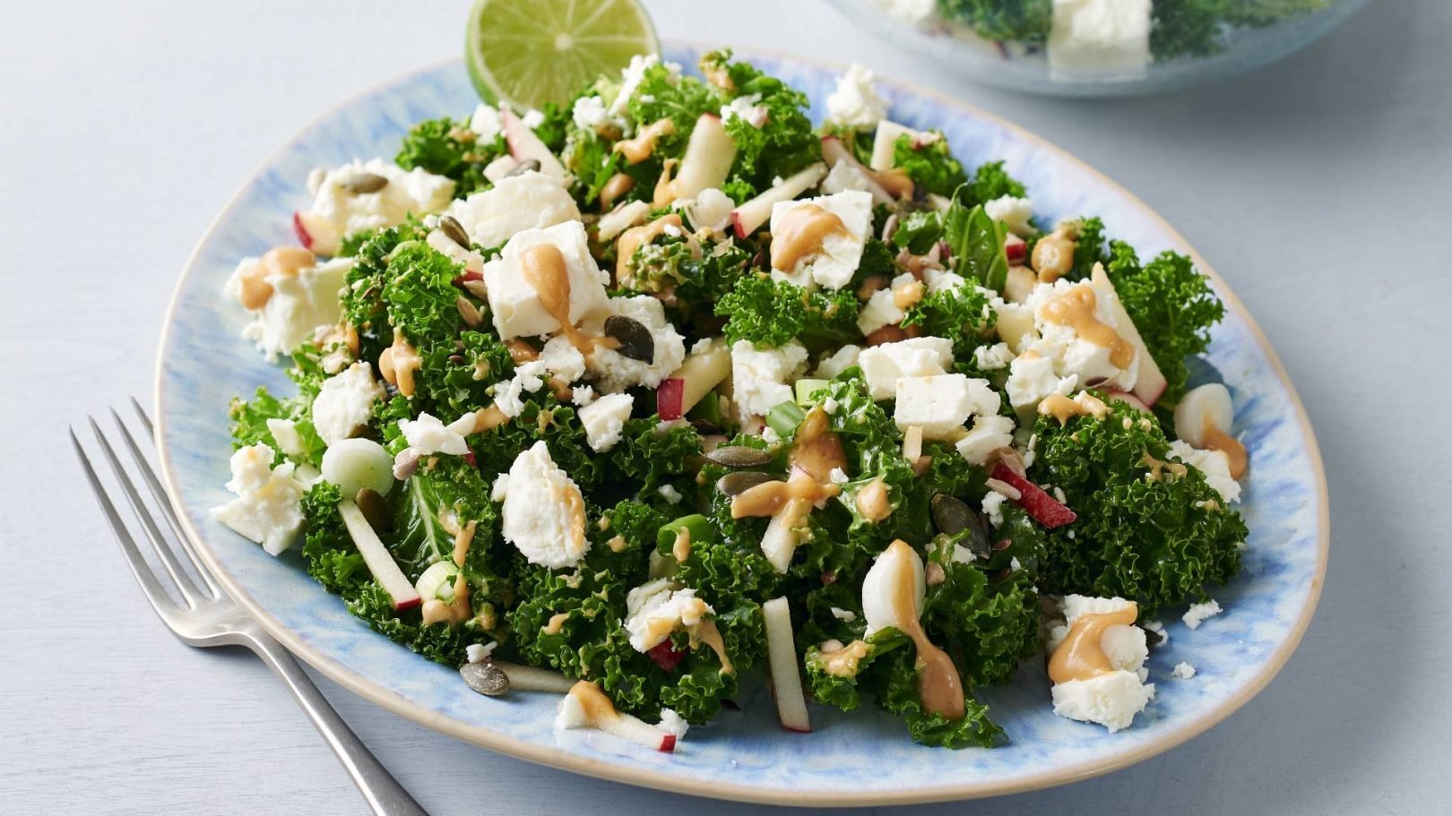 Kale and apple salad with peanut butter dressing