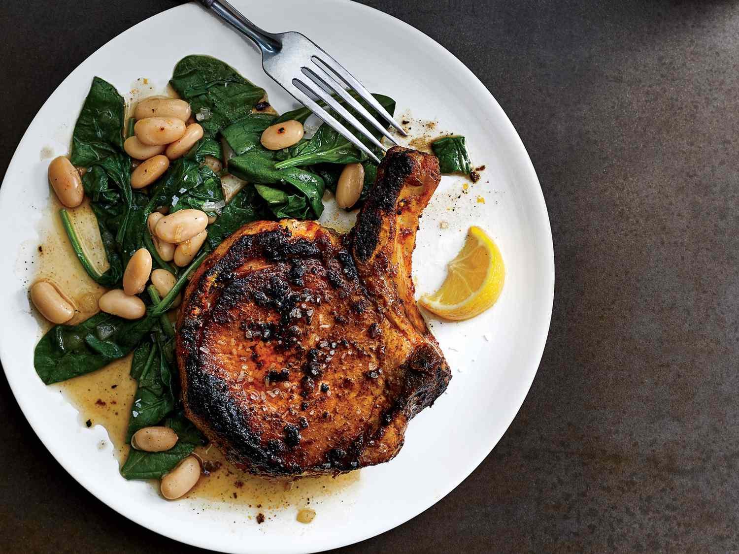 Blackened Skillet Pork Chops with Beans and Spinach