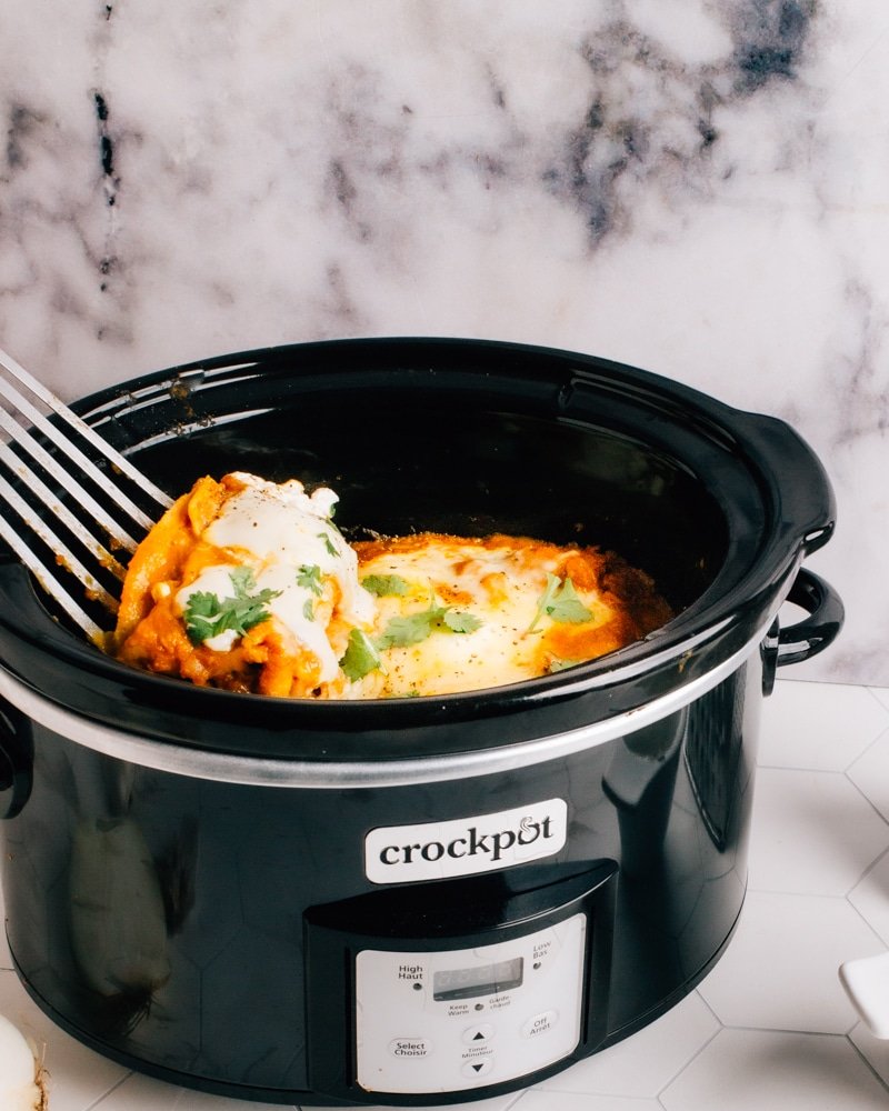 Crockpot Slow Cooker Chicken Enchiladas with Spicy Pumpkin Sauce