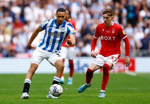 What is the latest with Jon Russell’s situation at Huddersfield amid West Brom transfer talk?