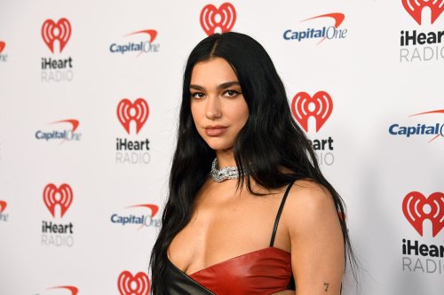 Dua Lipa Celebrates the Holiday Season in a Leather on Leather Look With Sharp Lace-Up Boots at iHeartRadio’s Jingle Ball 2022
