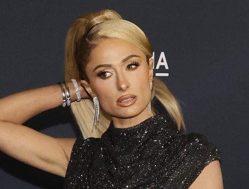 Paris Hilton flashes the flesh in skimpy beaded cut-out gown while ...