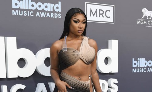 Megan Thee Stallion Impressively Dips & Pops in Football Game With Cardi B in Chunky Sneakers On ‘Cardi Tries’