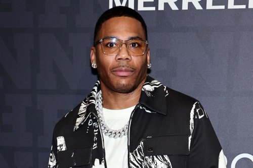 Nelly Pops in Spiked Silver Christian Louboutin Sneakers at FN Achievement Awards 2022