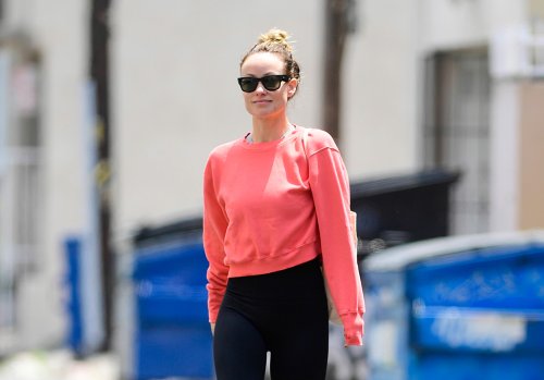 Olivia Wilde Hits the Gym in Her Favorite Adidas Ultraboost Sneaker and a Hot Pink Crew-Neck Sweater