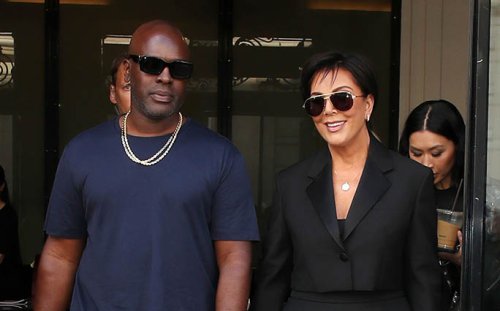 Kris Jenner Gets Edgy In Cropped Blazer, High-Waist Trousers & Shiny Boots With Corey Gamble In Paris