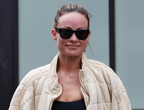 Olivia Wilde Takes to the Gym in Black Athletic Wear and White Adidas Ultraboost Sneakers