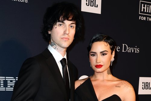 Demi Lovato Wears Cinched Layered Dress with Boyfriend Jordan Lutes at Pre-Grammy Gala 2023