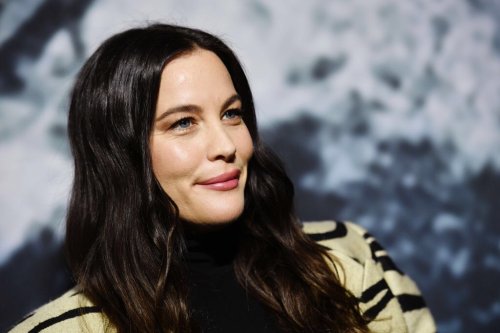 Liv Tyler Goes Wild in Tiger Print Coat & Sharp Pumps at Stella McCartney x Adidas Party