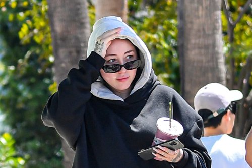 Noah Cyrus Takes Gen-Z Style Trends to the Streets in Baggy Jeans & Double Hoodies With Controversial Sneakrs